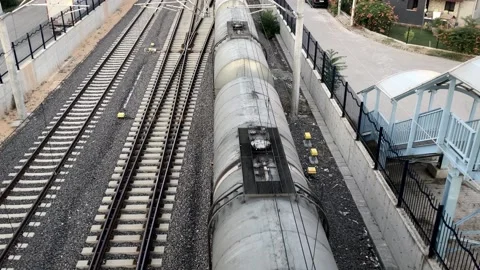 Top view of freight train on railways at the city center. Stock Footage 136463506