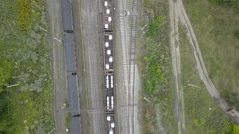 Top view: freight train rides on rails. Stock Footage 124913161