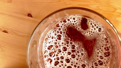 Top of view of fresh beer with foam on wood background, beverage and relax Stock Footage 260483547