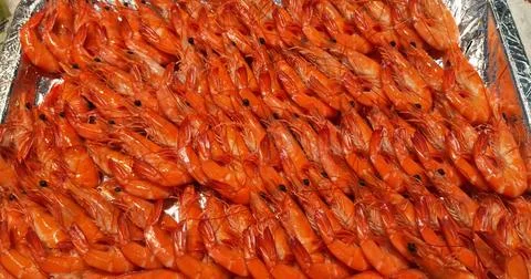 Top view of fresh boiled orange prawns. Stock Photos