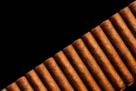 Top view fresh close-up cigars. Diagonal layout to copy space Stock Photos