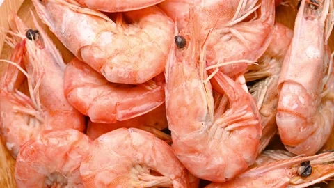 Top view fresh cooked shrimps rotating at horizontal composition 스톡 동영상 233960128