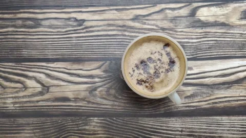 Top View of A Fresh Cup of Coffee with Cocoa Granule Stock Footage 315088548
