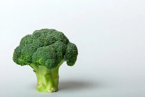 Top view fresh green broccoli vegetable on Colored background. Broccoli cabba Stock Photos