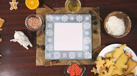 Top view of Fresh made Cinnamon Gingerbread Cookies, decorated with sugar glaze Stock Footage 66447801
