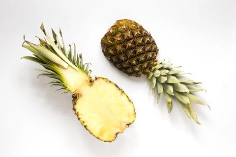 Top view fresh pineapple on the table. High quality and resolution beautiful Stock Photos