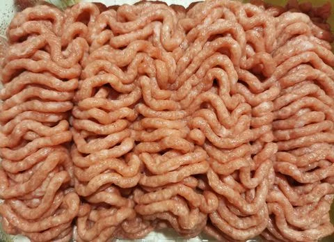 Top view of fresh raw minced turkey meat. Stock Photos