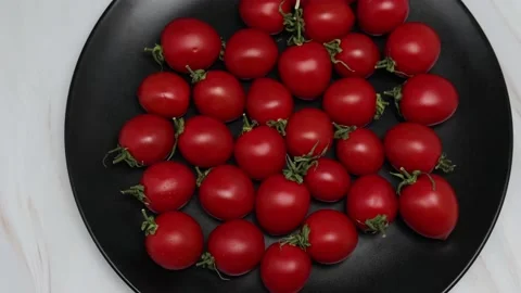 Top View Of Fresh Red Cherry Tomatoes On A Black Plate. Dolly In. Slider Shot. C Stock Footage 150822547