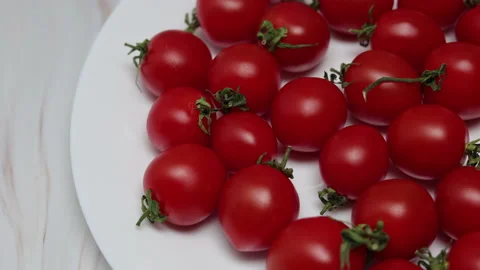 Top View Of Fresh Red Cherry Tomatoes On A White Plate. Panning Dolly Slider Sho Stock Footage 150822858