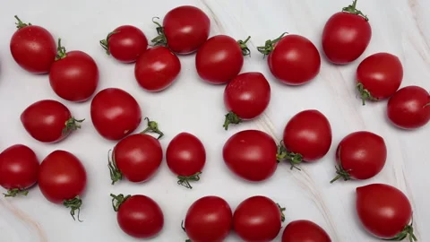 Top View Of Fresh Red Cherry Tomatoes On A Marble Background. Panning Dolly Slid Vídeos de archivo 150900236