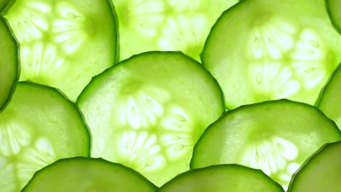 Top view of fresh sliced cucumber rotation. Stock Footage 107508506