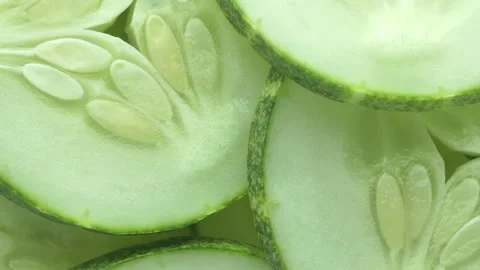 Top view of fresh sliced cucumber rotation Video stock 130767029