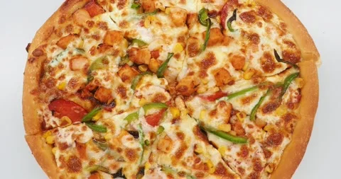 Top View Of A Freshly Baked, Rotating Top Meat Pizza, London, UK 動画素材 267616471