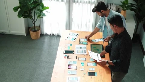 Top view of front-end developer design Ux Ui interface with team. Convocation. Stock Footage 266599055