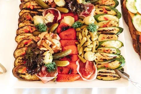 Top view of fruit and vegetable buffet table. Various types of fresh and grilled Stock Photos