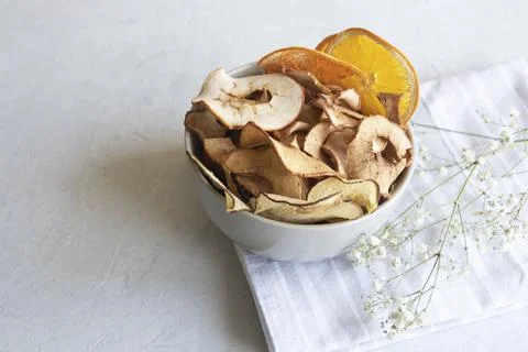Top view, fruit chips, healthy snacks to eat, homemade apple chips for brea.. Stock Photos