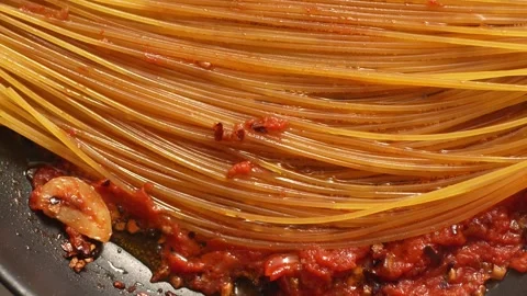 Top view of Frying Pasta with Tomato Sauce. Stock Footage 263758855