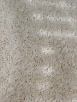 Top View Full Frame Texture of Raw White Long Grain Rice Stock Photos