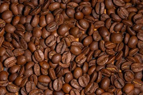 Top view full frame texture of medium roasted aromatic coffee beans 스톡 사진