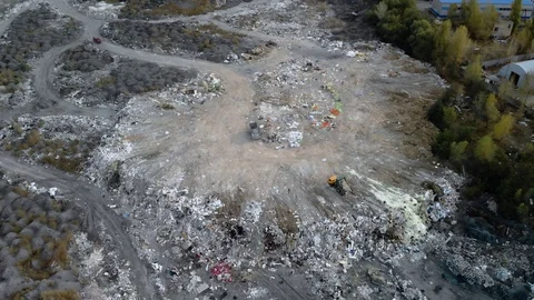 Top view of a garbage dump. A truck unloads garbage in a landfill. 4k Stock-Footage 122389957