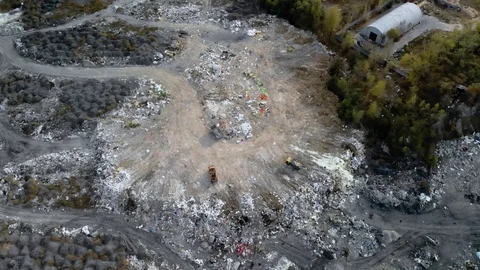 Top view of a garbage dump. A truck unloads garbage in a landfill. 4k Video stock 122390055