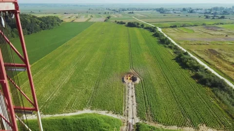 Top view of gas pipeline section. Oil gas processing plant. Dirt road, forest Stock Footage 219953243