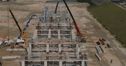 Top view of a giant construction site and cranes Video stock 138271229