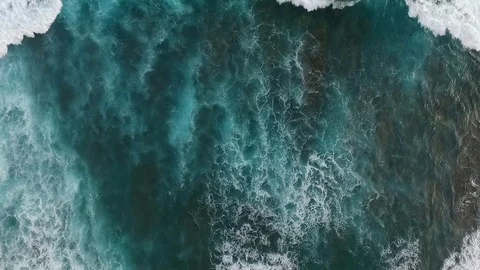 Top View of the Giant Waves, Foaming and Splashing in the Ocean Stock Footage 75531036