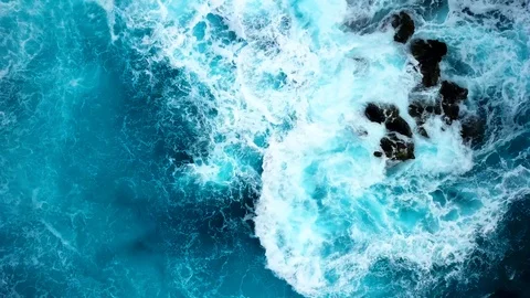 Top View of the Giant Waves, Foaming and Splashing in the Ocean Stock Footage 103322585
