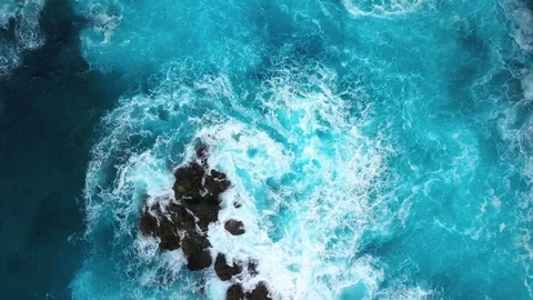 Top View of the Giant Waves, Foaming and Splashing in the Ocean Stock Footage 103323117
