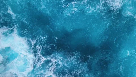 Top View of the Giant Waves, Foaming and Splashing in the Ocean Stock Footage 103323290