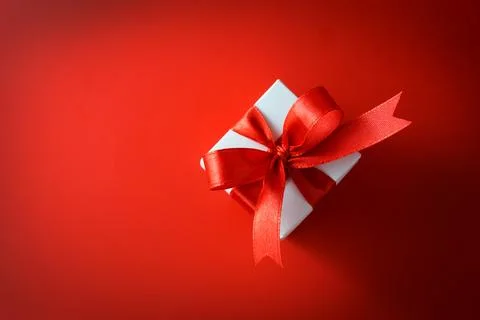 Top view of gift box on red background Stock Photos