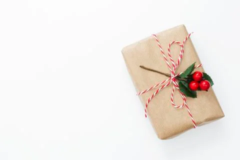 Top view gift box wraped in craft paper, isolated white background mockup cop Stock Photos