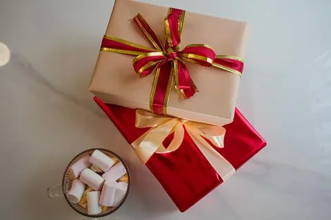 Top View of Gift Boxes with Hot Cocoa and Marshmallows Stock Photos