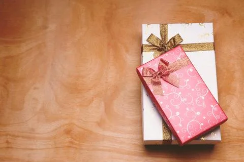 Top view of gift boxes on the wooden table. Free space for text Stock Photos