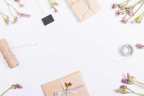 Top view of gifts in package, decorations and flowers 库存照片