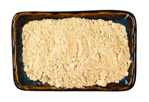 Top view of ginger powder in ceramic bowl cutout Stock Photos