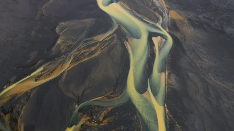 Top view of glacial rivers surrounded by black sand in Iceland Stock Footage 120466584