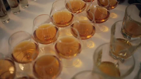 Top view of glasses with different alcohol drinks on a table at wedding Stock Footage 65957529