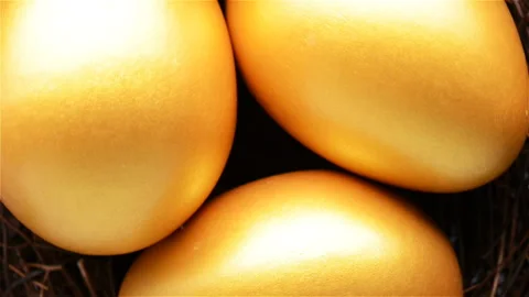 Top view gold eggs rotating Stock Footage 101719606