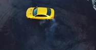 Top View Of The Golden Car Drifting On The Road. Сar Makes A Few Laps. Stock Footage