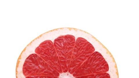 Top view of grapefruits cross cut rotating. Isolated. White background. Stock-Footage 158537228