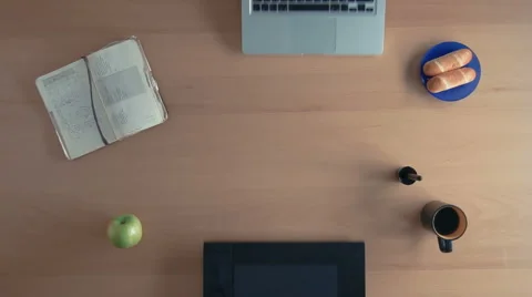Top view graphics tablet and laptop appearing on the table and designer woman Stock Footage 67362578