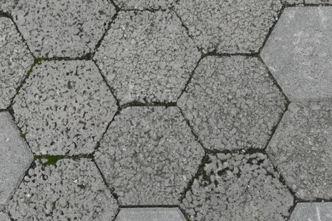 Top view of Gray interlocking paving stone driveway. Stock Photos