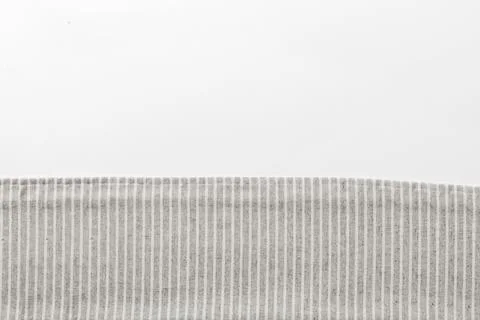 Top view with gray kitchen napkin isolated on table background. Folded cloth  Stock Photos