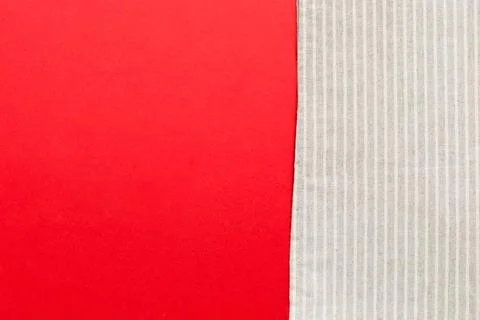 Top view with gray kitchen napkin isolated on table background. Folded clot.. Stock Photos