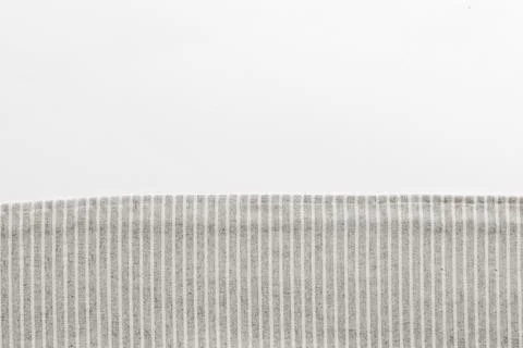 Top view with gray kitchen napkin isolated on table background. Folded cloth  Stock Photos