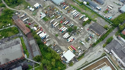 Top view of gray metropolis. Panorama of big city with areas and passing long Stock Footage 113532832