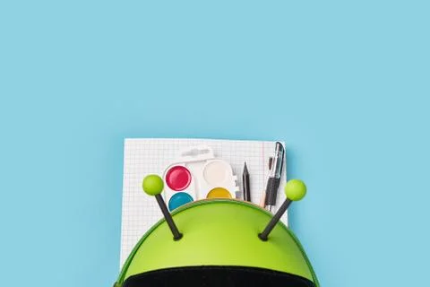 Top view of green backpack with school stationery. preschool back to school Stock Photos
