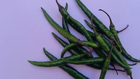 Top view of Green Chilies on a white background 库存影片 333555337